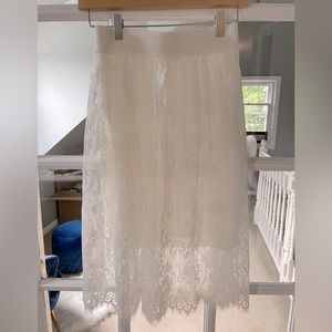 Brand new lacy elegant skirt. Size: small. Lucy Paris. Final sale.